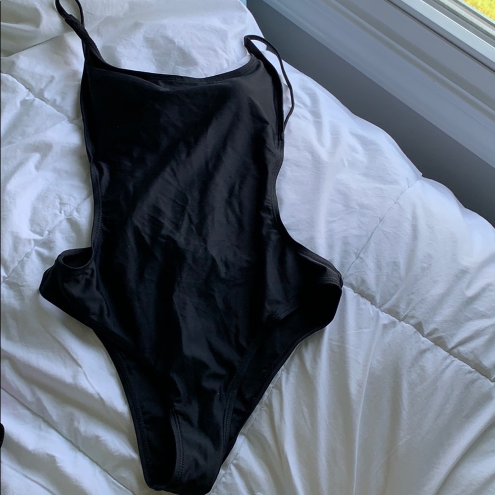 famous black pamela sunny suit!